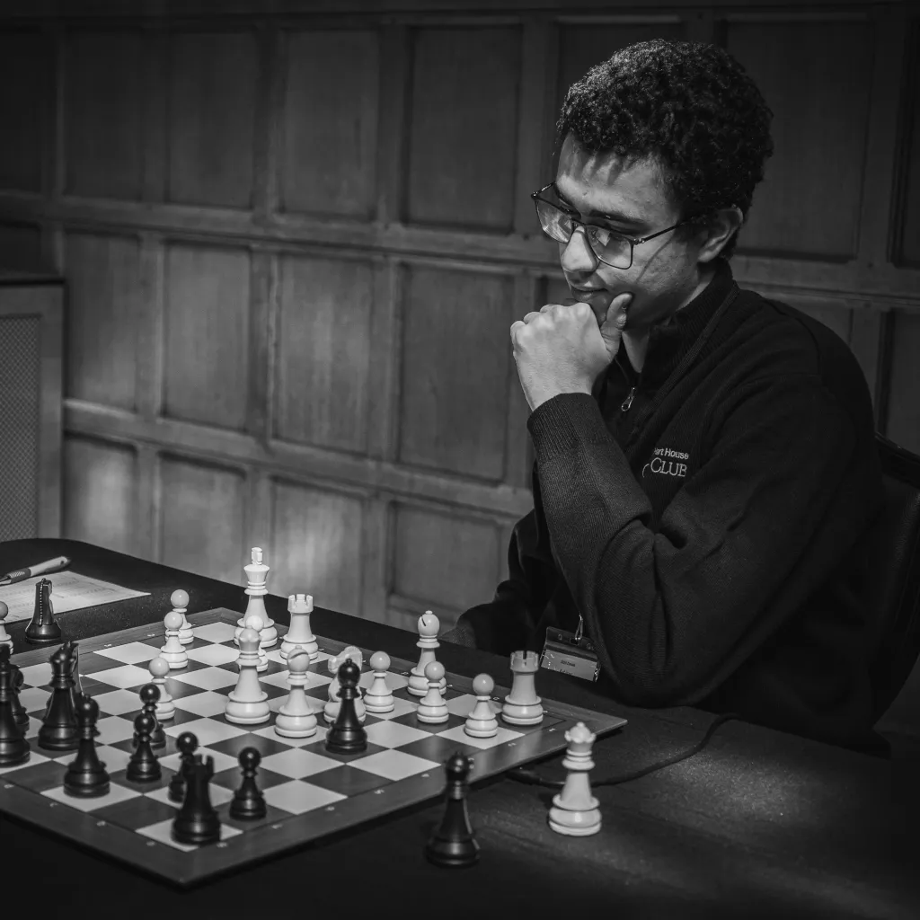 Image of Ahmed Khalf playing chess.